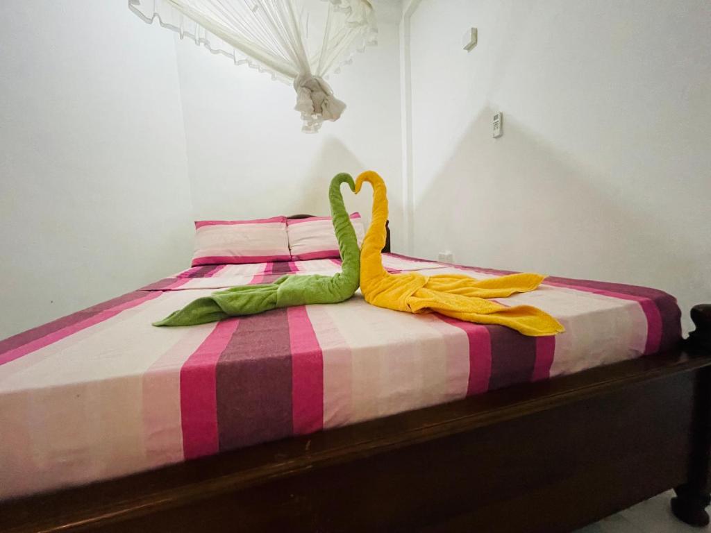 Postel nebo postele na pokoji v ubytování Su Yu villa