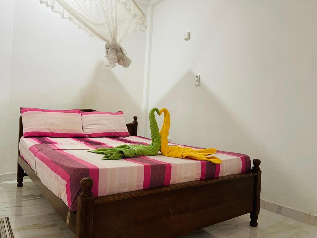 Postel nebo postele na pokoji v ubytování Su Yu villa