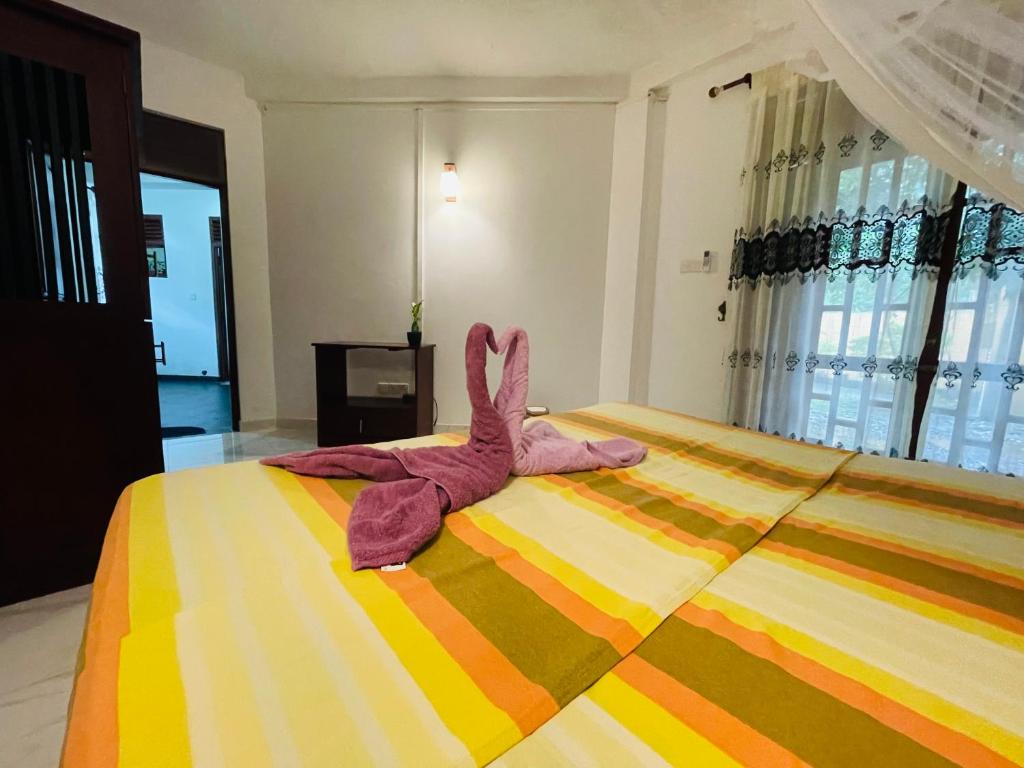 Postel nebo postele na pokoji v ubytování Su Yu villa