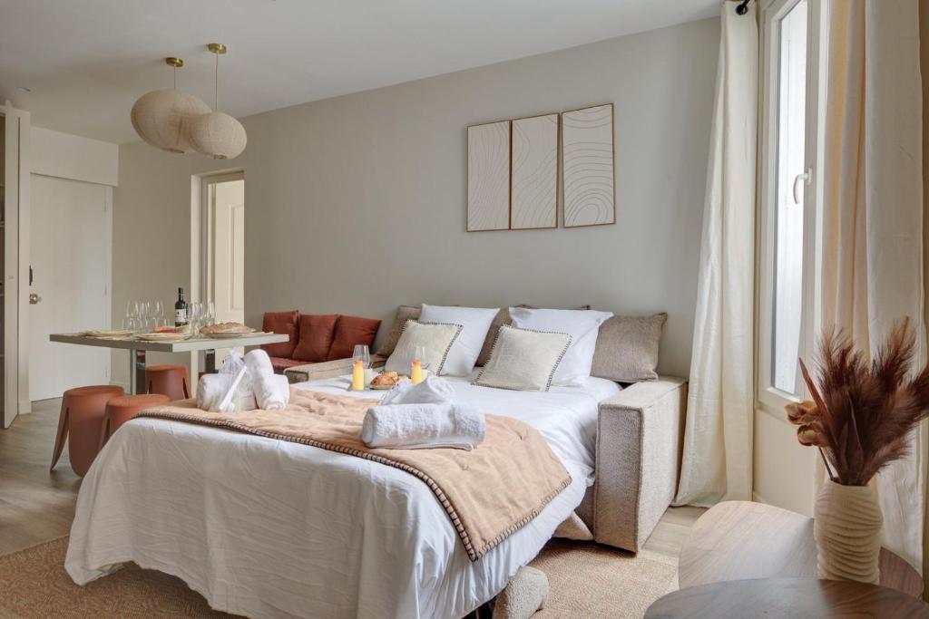 Postel nebo postele na pokoji v ubytování 201 Suite Anne - Superbe appartement