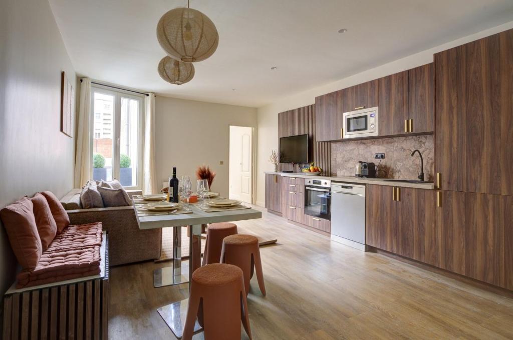 Kuchyň nebo kuchyňský kout v ubytování 201 Suite Anne - Superbe appartement