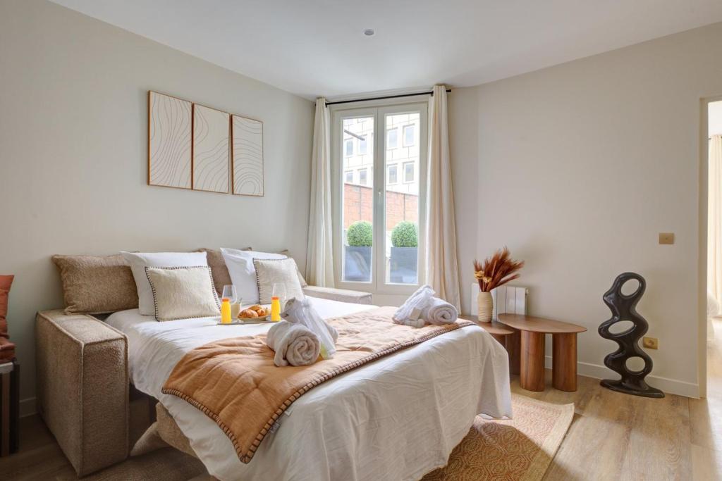 Postel nebo postele na pokoji v ubytování 201 Suite Anne - Superbe appartement