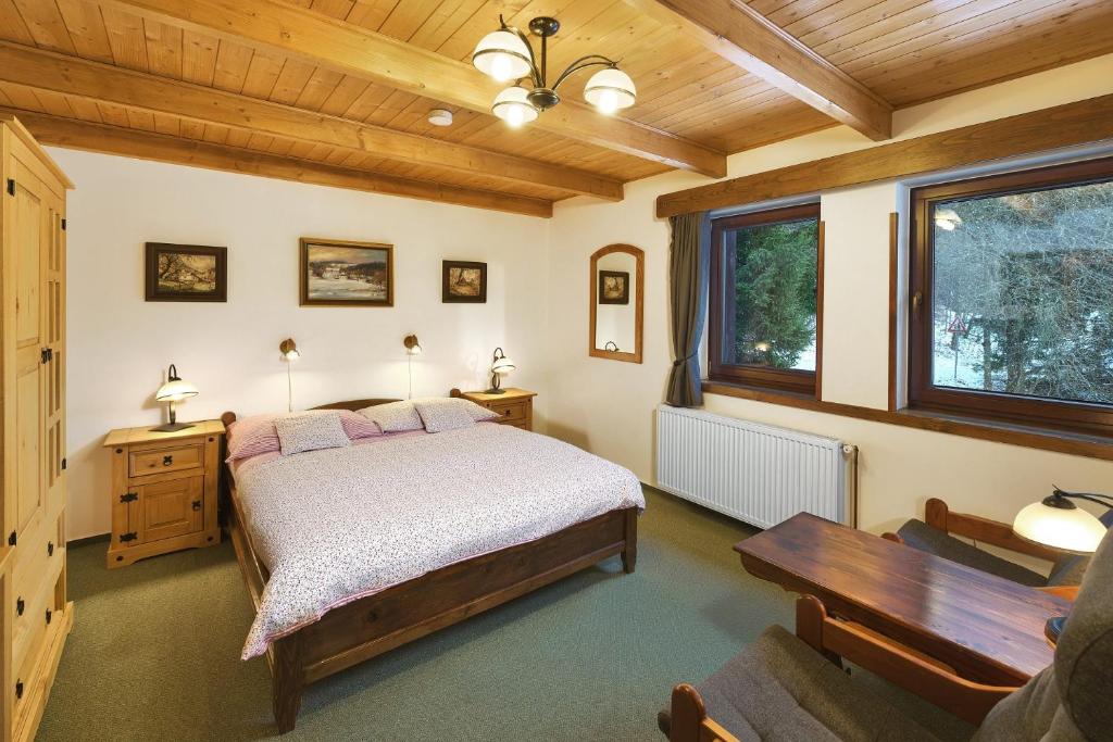 Postel nebo postele na pokoji v ubytování Penzion Hana
