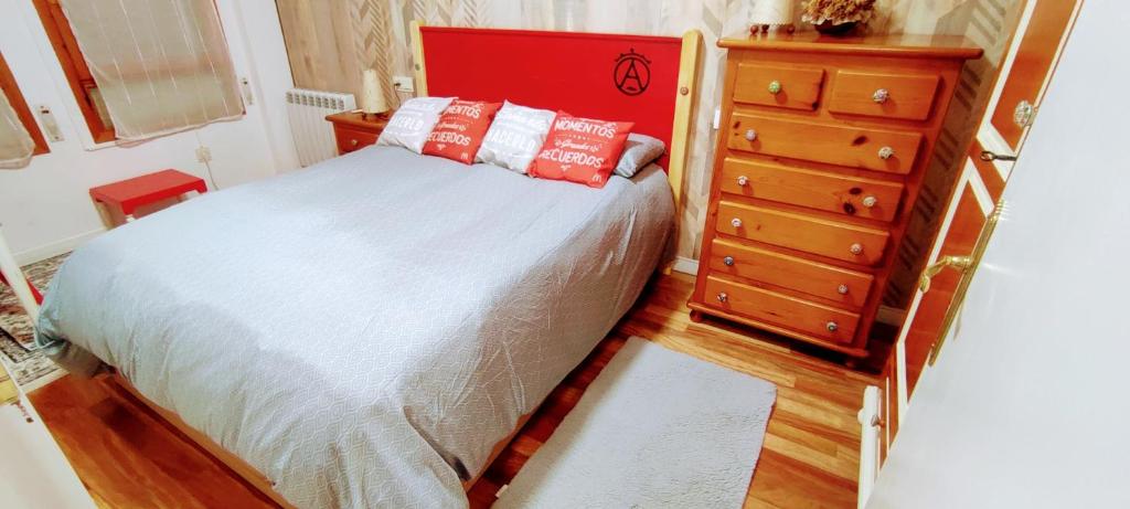 Postel nebo postele na pokoji v ubytování Carlina Canfranc
