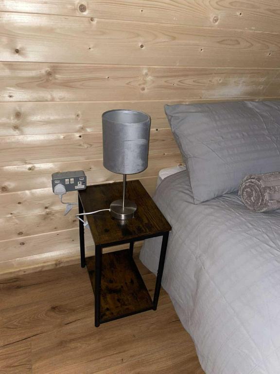 Letto o letti in una camera di Executive Pod and Jacuzzi