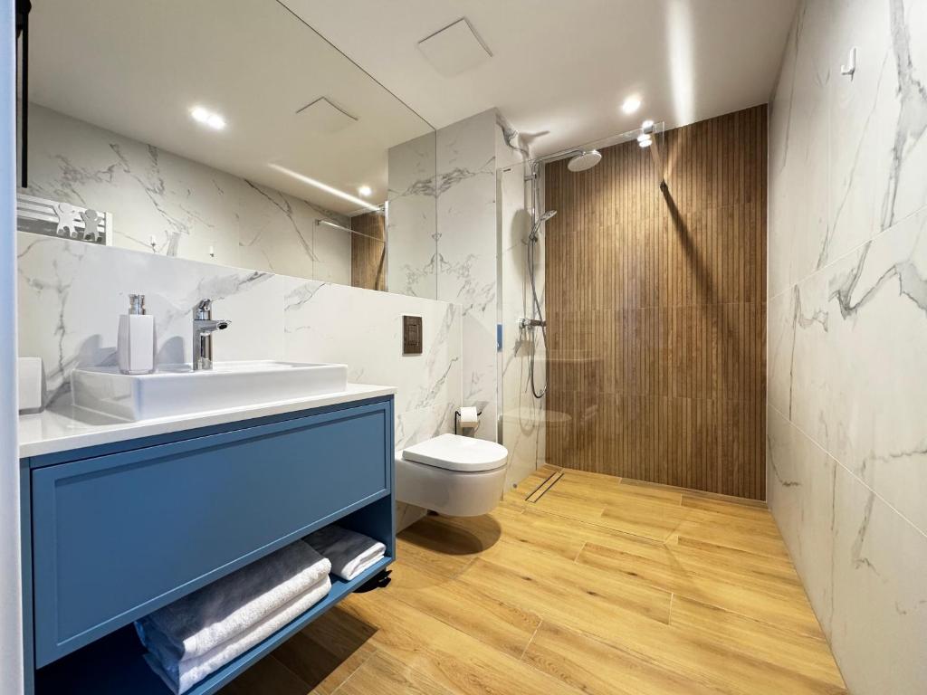Koupelna v ubytování Aparthotel Anchoria Holiday Honest-Serwis