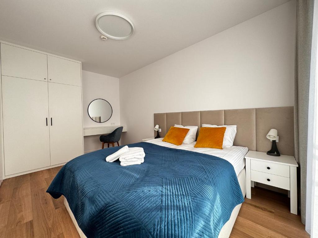 Postel nebo postele na pokoji v ubytování Aparthotel Anchoria Holiday Honest-Serwis
