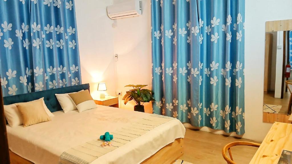 Postel nebo postele na pokoji v ubytování Villa Kiara