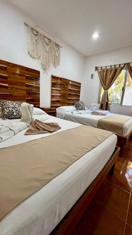 Postel nebo postele na pokoji v ubytování Valerios Hotel