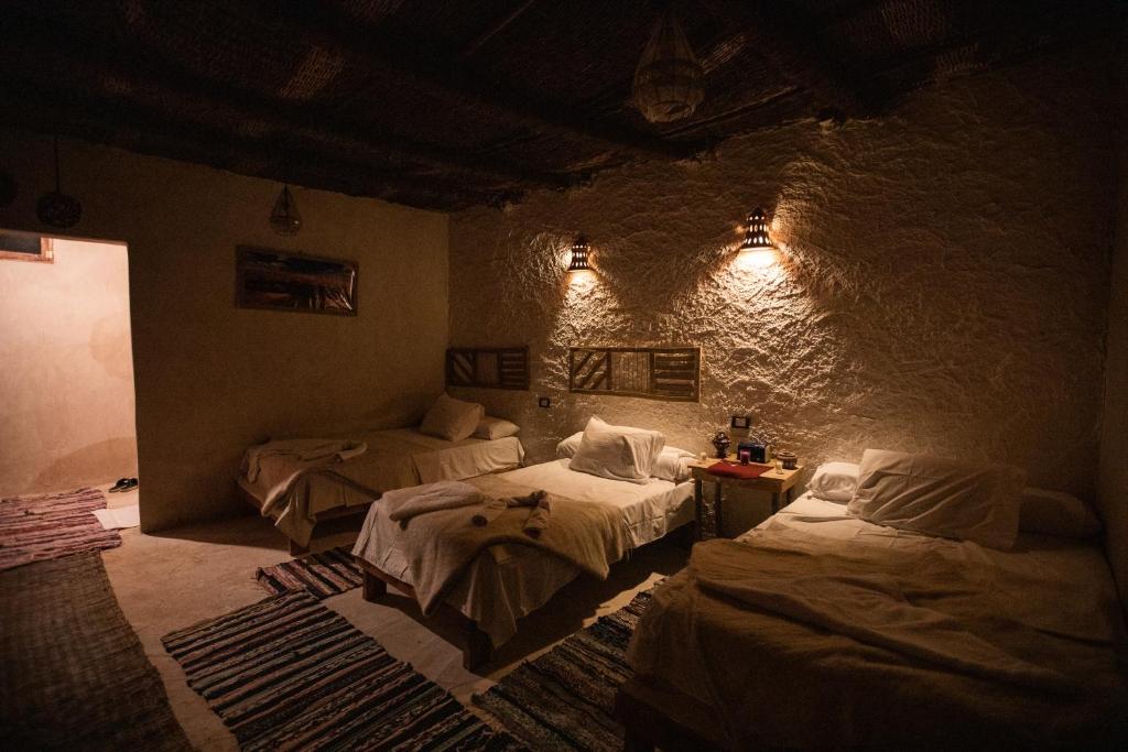 Postel nebo postele na pokoji v ubytování Eswan island Hotel