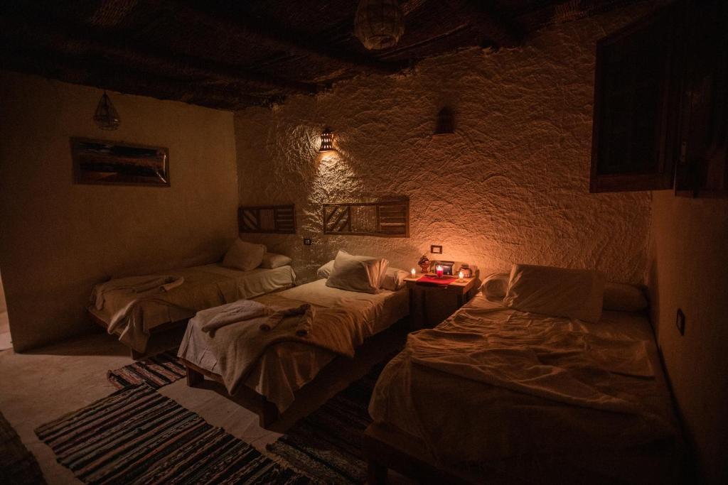 Postel nebo postele na pokoji v ubytování Eswan island Hotel