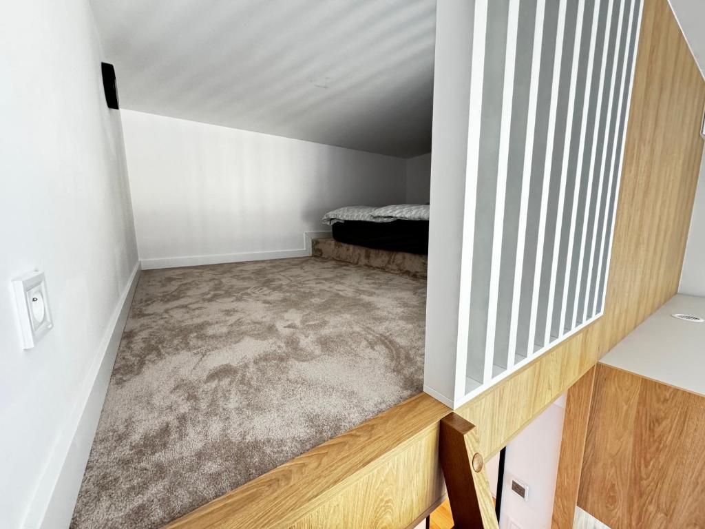 Postel nebo postele na pokoji v ubytování Aparthotel Anchoria Holiday Honest-Serwis