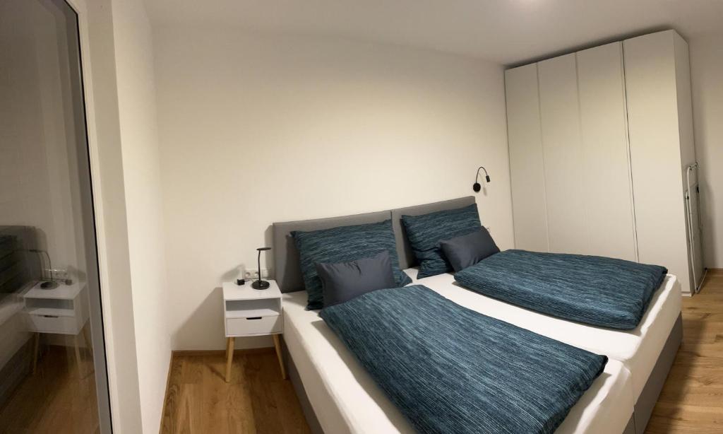 Postel nebo postele na pokoji v ubytování Ferienwohnung Karrensicht