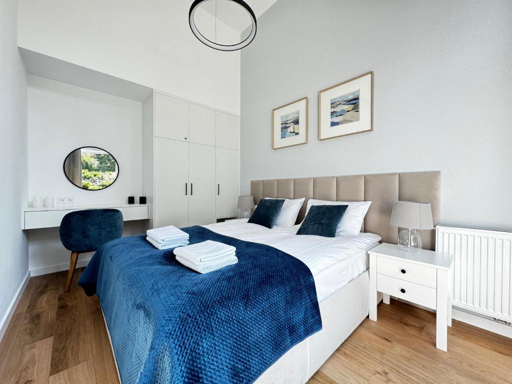 Postel nebo postele na pokoji v ubytování Aparthotel Anchoria Holiday Honest-Serwis