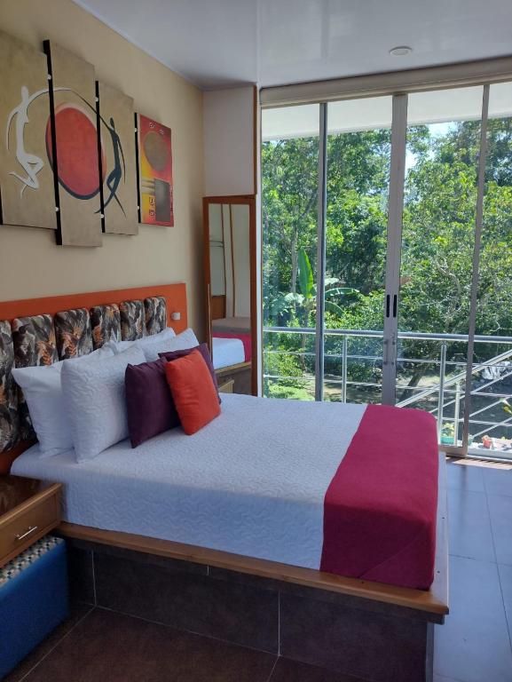 Postel nebo postele na pokoji v ubytování ATENEA SPA Hotel