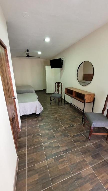 TV a/nebo společenská místnost v ubytování Hotel Amecatl