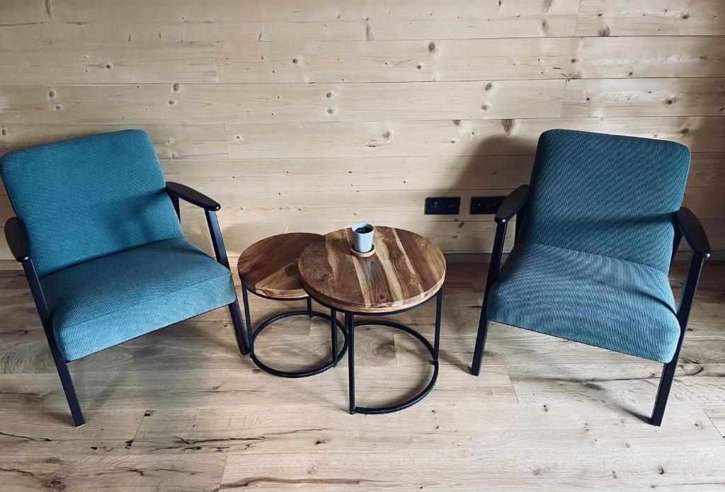 Posezení v ubytování Entspannen im Holzchalet mit Panoramablick, Ruhe und Infrarotsauna