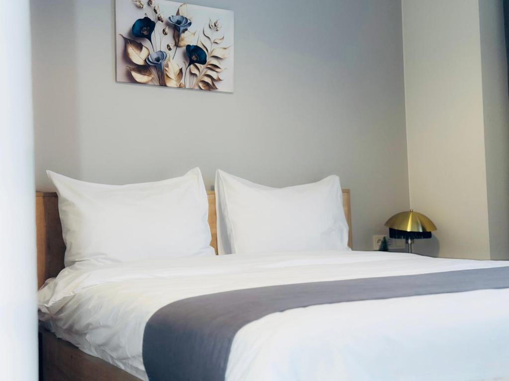 Voodi või voodid majutusasutuse HOTEL ARCHI KOKHTA BAKURIANI toas
