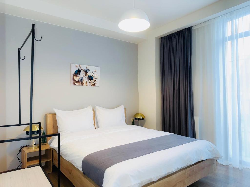 Voodi või voodid majutusasutuse HOTEL ARCHI KOKHTA BAKURIANI toas