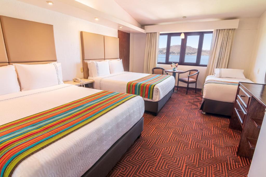 Cama ou camas em um quarto em Sonesta Posadas del Inca Puno