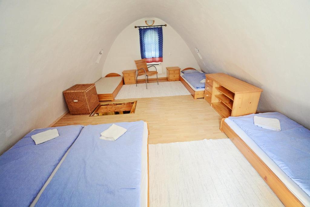 Postel nebo postele na pokoji v ubytování Syparne
