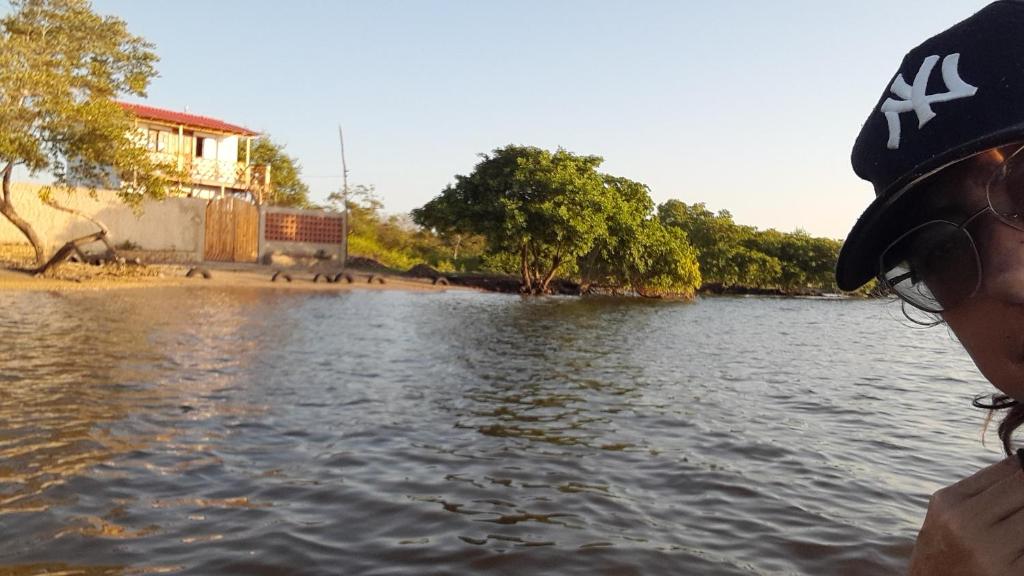 a person on a boat in the water at Cabaña Barbacoas in Santa Ana