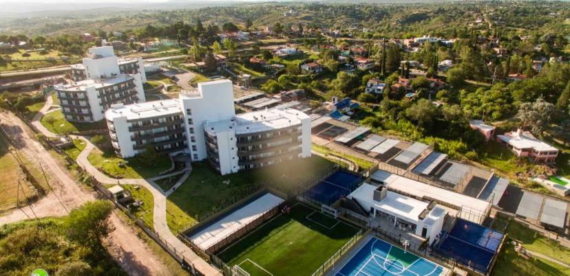 an aerial view of a city with tall buildings at Departamento en Veneto Village Resort y Spa in Villa Parque Siquiman