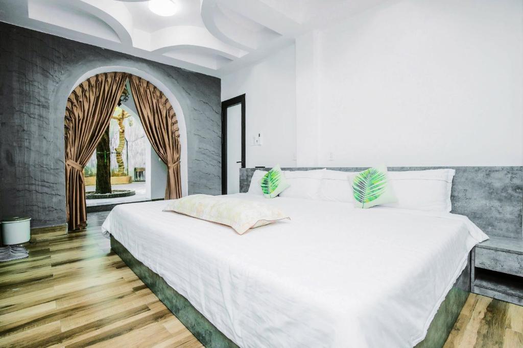 Postel nebo postele na pokoji v ubytování HELLO VILLA & SPA