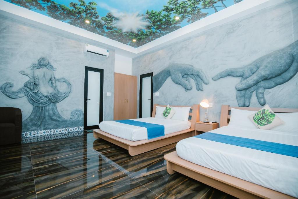 Postel nebo postele na pokoji v ubytování HELLO VILLA & SPA