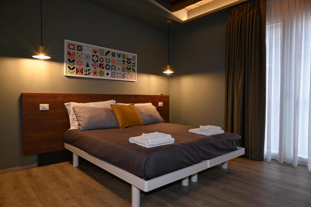 a bedroom with a bed in a room at La Maison in Polla