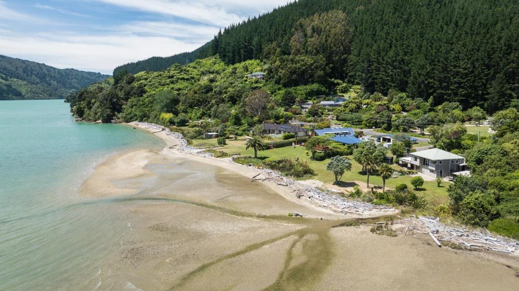 an aerial view of a resort on a beach at Linkwater Wonder - Marlborough Holiday Home in Picton