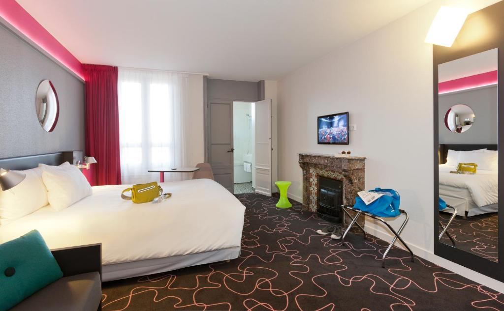 TV a/nebo společenská místnost v ubytování ibis Styles Roanne Centre Gare