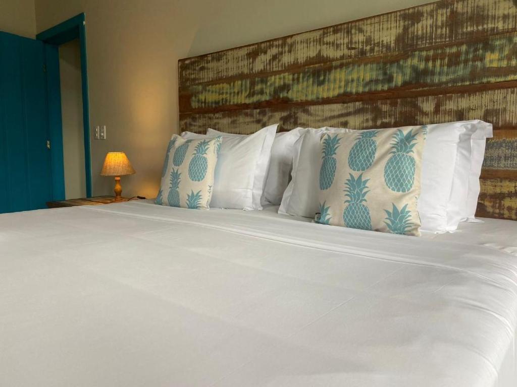 Postel nebo postele na pokoji v ubytování Quinta Brasilis Boutique Hotel Paraty