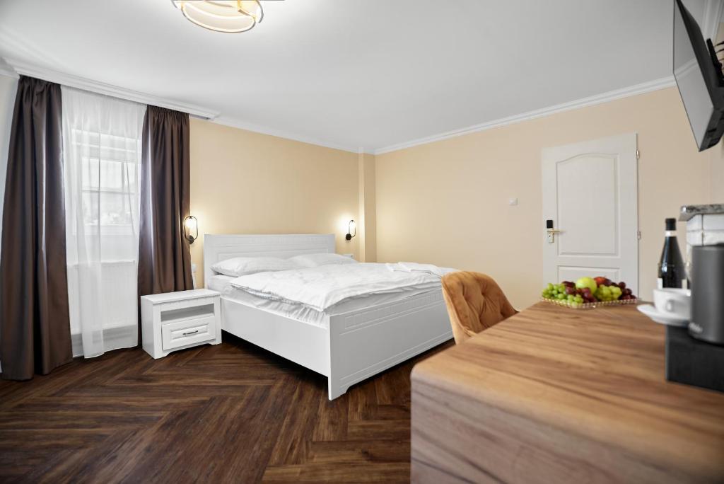 Postel nebo postele na pokoji v ubytování Chateau Franz