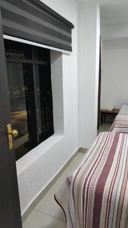 Postel nebo postele na pokoji v ubytování Stefanich Aparthotel 90