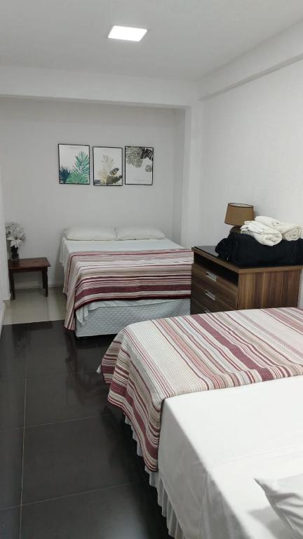 Postel nebo postele na pokoji v ubytování Stefanich Aparthotel 90