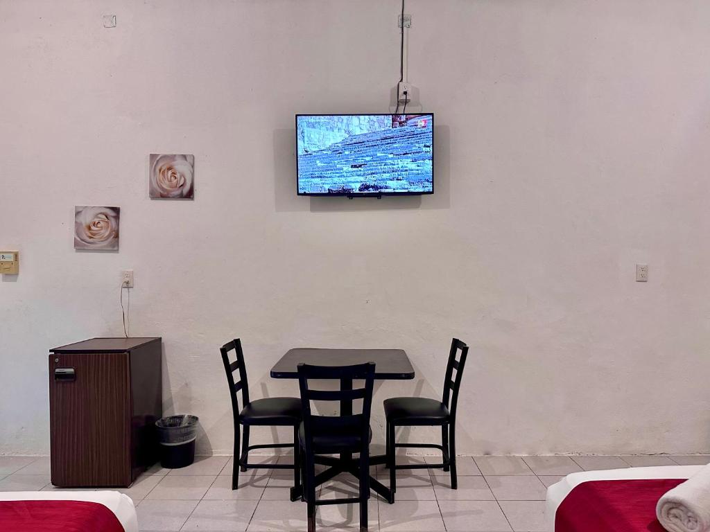 TV a/nebo společenská místnost v ubytování Casa Vidal Hotel