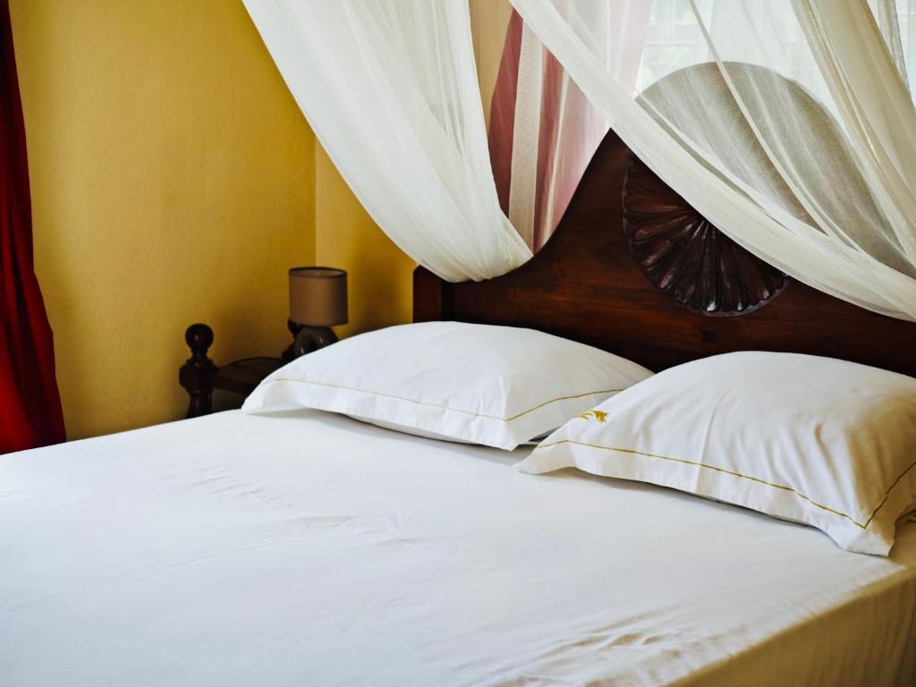 Postel nebo postele na pokoji v ubytování Gîte Acélie