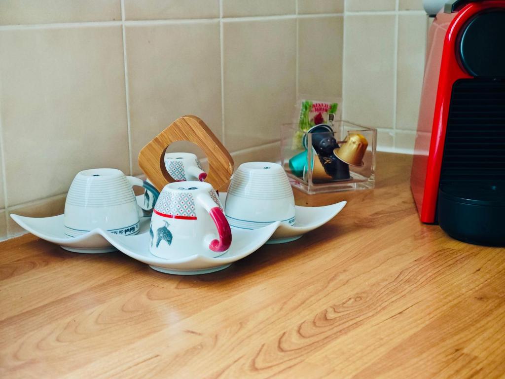 Příslušenství pro přípravu čaje a kávy v ubytování Gîte Acélie