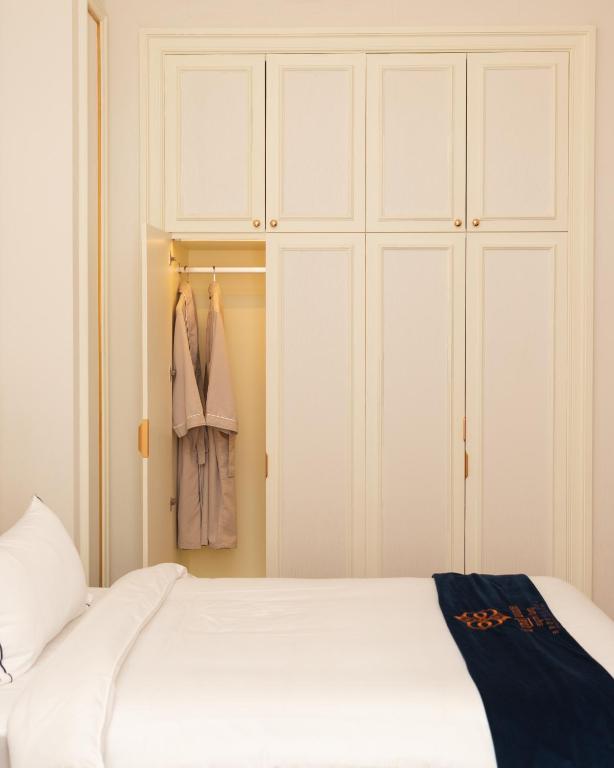 Postel nebo postele na pokoji v ubytování THE PREMIER PALACE HOTEL AND SPA