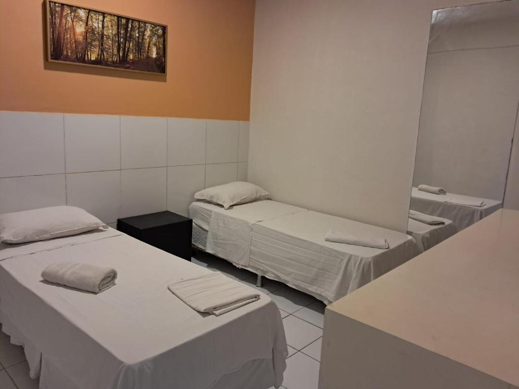 Pousada Recife Tropicalにあるベッド