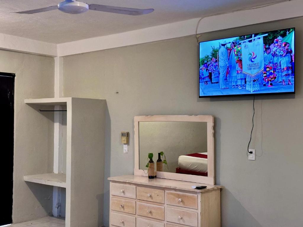 TV a/nebo společenská místnost v ubytování Casa Vidal Hotel