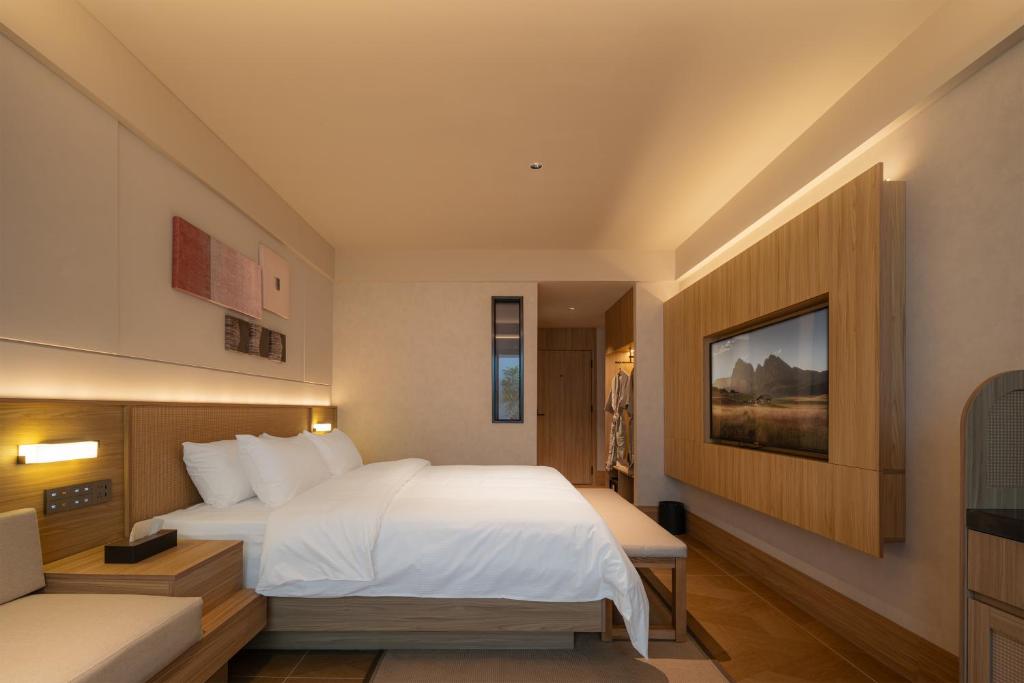 Postel nebo postele na pokoji v ubytování Maiyue Hotel-Xi`an Zhonggulou