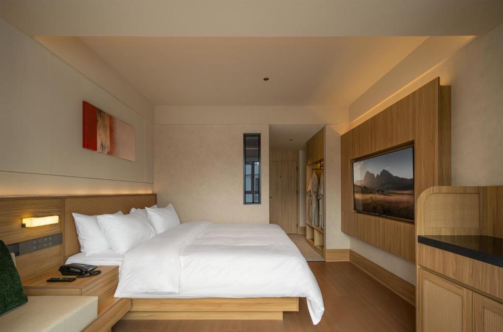 Postel nebo postele na pokoji v ubytování Maiyue Hotel-Xi`an Zhonggulou