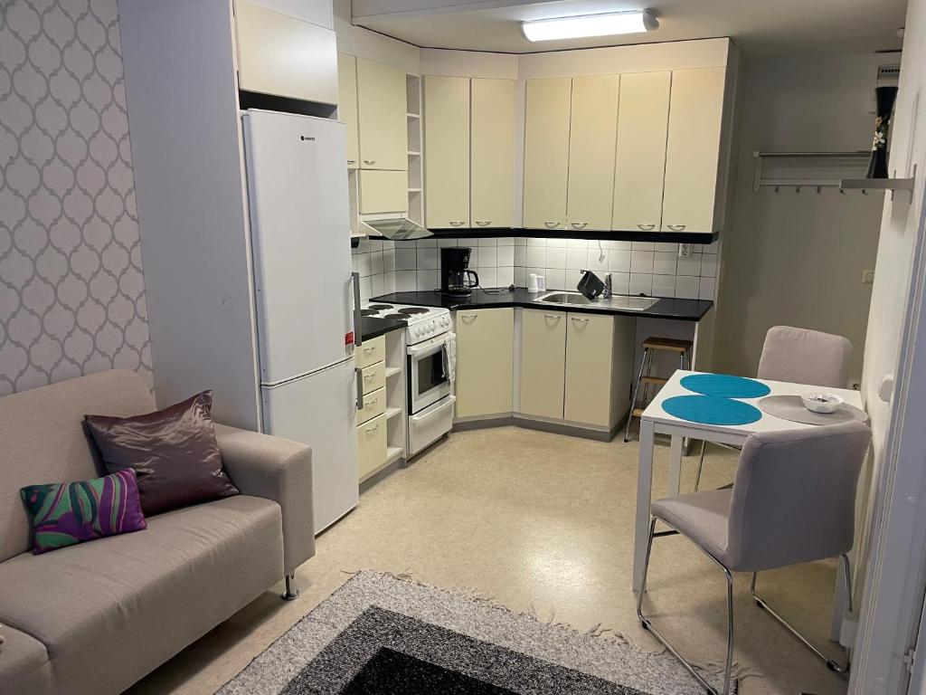 Kuchyň nebo kuchyňský kout v ubytování Aarni - SimpleStudio in Tornio