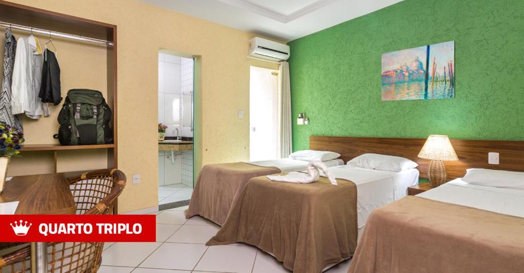 Postel nebo postele na pokoji v ubytování Hotel Imperial