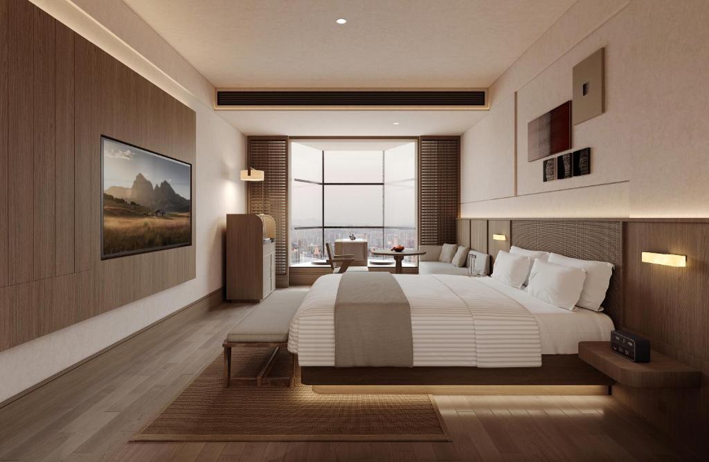 Postel nebo postele na pokoji v ubytování Maiyue Hotel-Xi`an Zhonggulou
