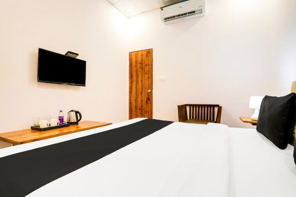 TV a/nebo společenská místnost v ubytování Super Hotel O Pardi Near Kalamna Market