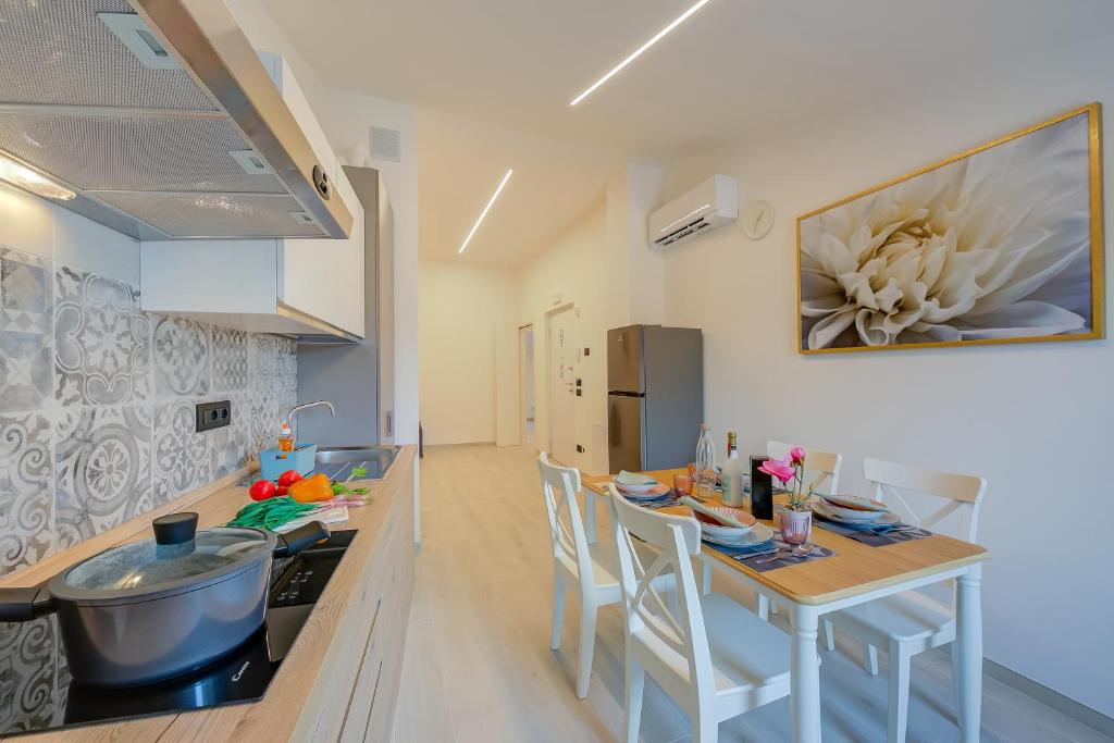 Kuchyň nebo kuchyňský kout v ubytování Magnolia Apt - Palazzo Palermo 1817 - Happy Rentals