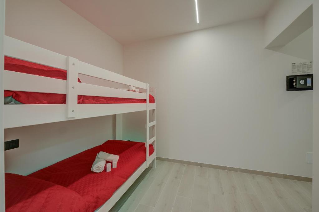 Postel nebo postele na pokoji v ubytování Magnolia Apt - Palazzo Palermo 1817 - Happy Rentals